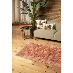 Photo of Dusty Rose Faux Fur Non Skid Area Rug