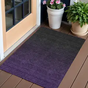 Photo of Eggplant Purple And Charcoal Abstract Washable Indoor Outdoor Area Rug