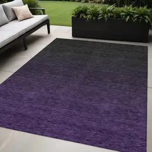 Photo of Eggplant Purple And Charcoal Abstract Washable Indoor Outdoor Area Rug