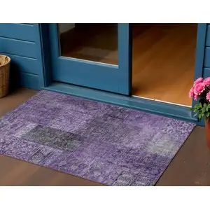 Photo of Eggplant Purple And Charcoal Patchwork Washable Indoor Outdoor Area Rug