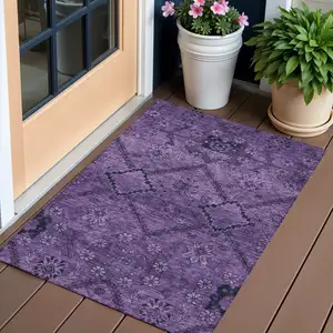 Photo of Eggplant Purple And Plum Floral Washable Indoor Outdoor Area Rug