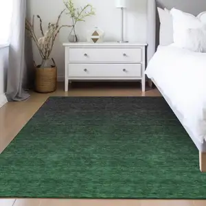 Photo of Emerald And Charcoal Abstract Washable Indoor Outdoor Area Rug