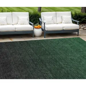 Photo of Emerald And Charcoal Abstract Washable Indoor Outdoor Area Rug