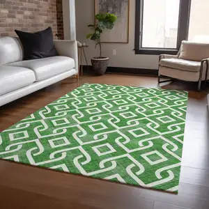 Photo of Emerald And Ivory Geometric Washable Indoor Outdoor Area Rug