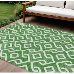 Photo of Emerald And Ivory Geometric Washable Indoor Outdoor Area Rug