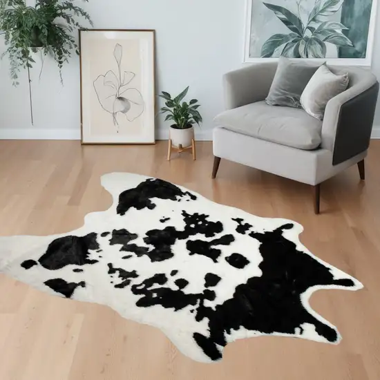 Black and White Faux Cowhide Animal Print Area Rug Photo 1