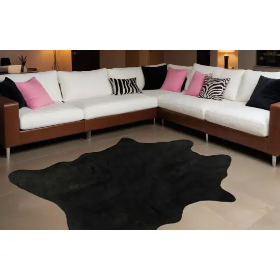 5' x 7' Black Faux Cowhide Area Rug Photo 1