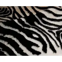 Photo of Faux Zebra Hide Black And White Area Rug