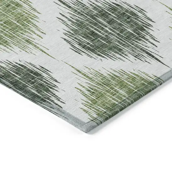 Fern Green And Ivory Ikat Washable Indoor Outdoor Area Rug Photo 5