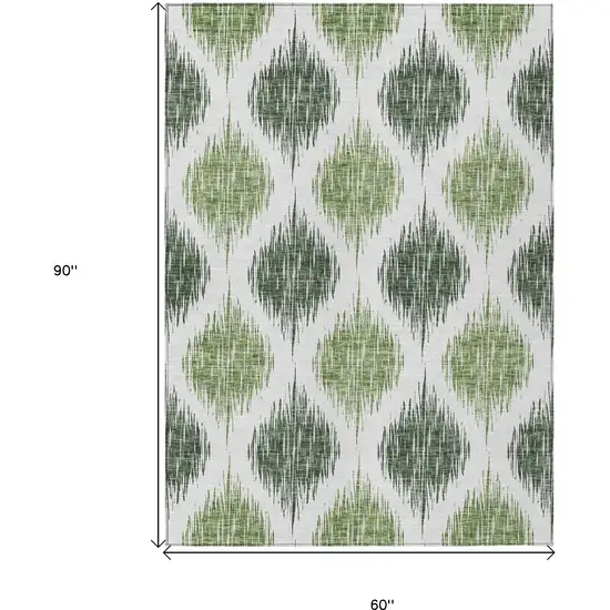 Fern Green And Ivory Ikat Washable Indoor Outdoor Area Rug Photo 3