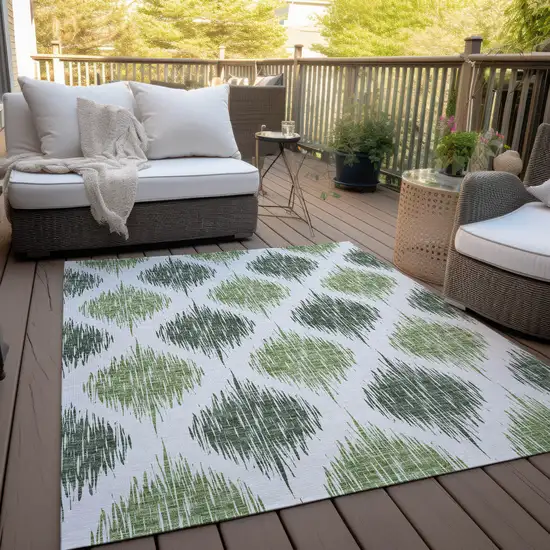 Fern Green And Ivory Ikat Washable Indoor Outdoor Area Rug Photo 7