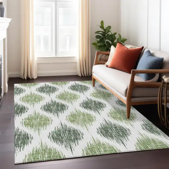 Fern Green And Ivory Ikat Washable Indoor Outdoor Area Rug Photo 9