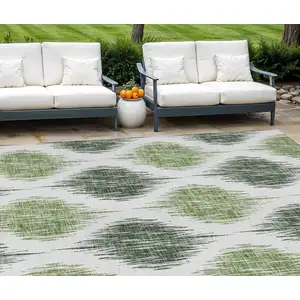 Photo of Fern Green And Ivory Ikat Washable Indoor Outdoor Area Rug