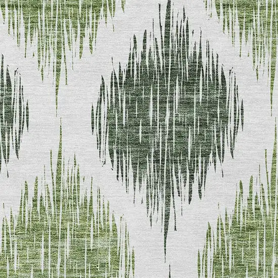 Fern Green And Ivory Ikat Washable Indoor Outdoor Area Rug Photo 6