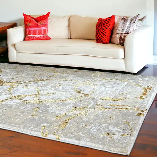 Gold Abstract Area Rug With Fringe Photo 1