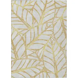 Photo of Gold And Beige Floral Washable Indoor Outdoor Area Rug