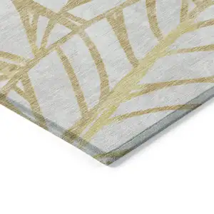 Photo of Gold And Beige Floral Washable Indoor Outdoor Area Rug