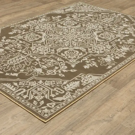 Gold And Beige Oriental Area Rug Photo 4