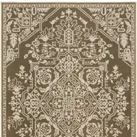 Photo of Gold And Beige Oriental Area Rug