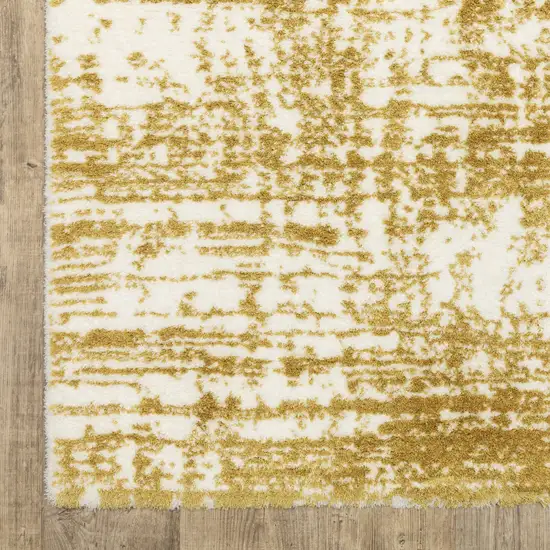 Gold And Ivory Abstract Area Rug Photo 5