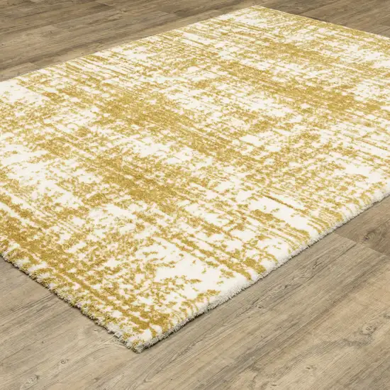 Gold And Ivory Abstract Area Rug Photo 9