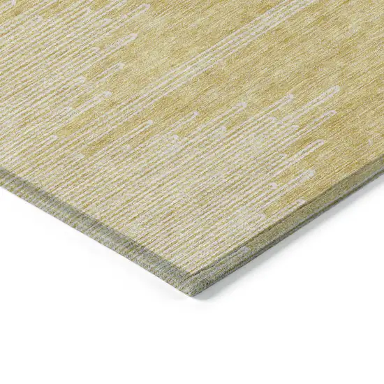 Gold And Ivory Abstract Washable Indoor Outdoor Area Rug Photo 4