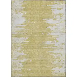 Photo of Gold And Ivory Abstract Washable Indoor Outdoor Area Rug