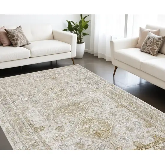 Gold And Ivory Floral Stain Resistant Area Rug Photo 1