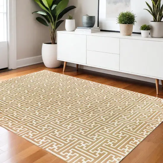 Gold And Ivory Geometric Power Loom Stain Resistant Area Rug Photo 1