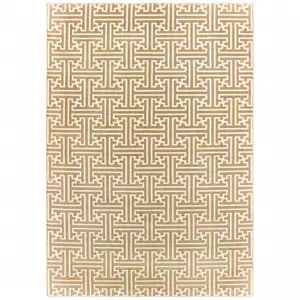 Photo of Gold And Ivory Geometric Power Loom Stain Resistant Area Rug