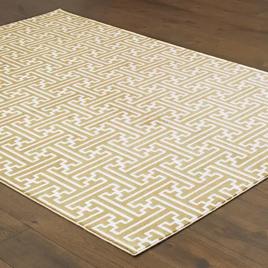 Gold And Ivory Geometric Power Loom Stain Resistant Area Rug Photo 4