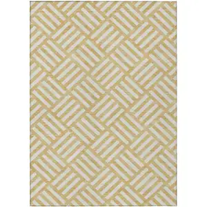 Photo of Gold And Ivory Geometric Washable Indoor Outdoor Area Rug