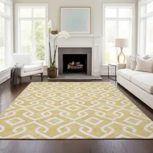 Photo of Gold And Ivory Geometric Washable Indoor Outdoor Area Rug