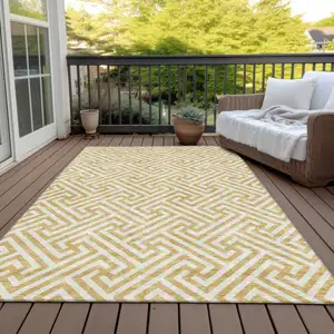 Photo of Gold And Ivory Geometric Washable Indoor Outdoor Area Rug