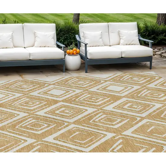 Gold And Ivory Geometric Washable Indoor Outdoor Area Rug Photo 1