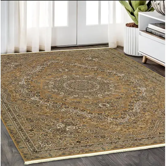 Gold And Ivory Medallion Area Rug With Fringe Photo 1