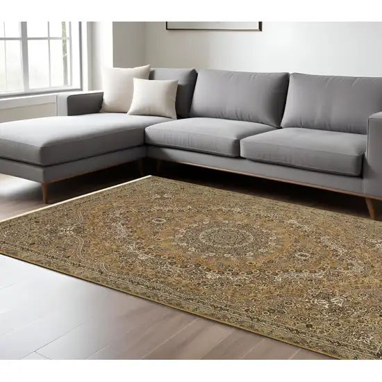 Gold And Ivory Medallion Area Rug With Fringe Photo 1