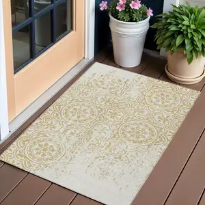 Photo of Gold And Ivory Medallion Washable Indoor Outdoor Area Rug