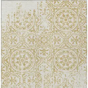 Photo of Gold And Ivory Medallion Washable Indoor Outdoor Area Rug