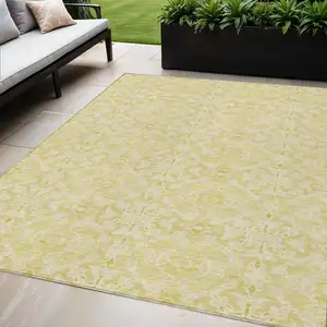 Photo of Gold And Ivory Medallion Washable Indoor Outdoor Area Rug