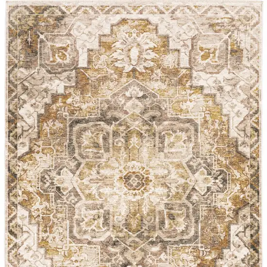 Gold And Ivory Oriental Power Loom Stain Resistant Area Rug With Fringe Photo 6