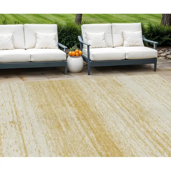 Gold And Ivory Striped Washable Indoor Outdoor Area Rug Photo 1