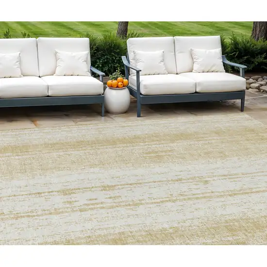 Gold And Ivory Striped Washable Indoor Outdoor Area Rug Photo 1