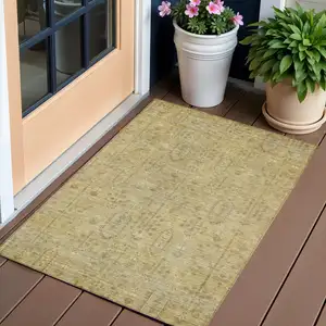 Photo of Gold And Taupe Southwestern Washable Indoor Outdoor Area Rug