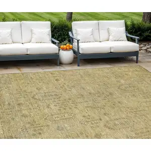 Photo of Gold And Taupe Southwestern Washable Indoor Outdoor Area Rug