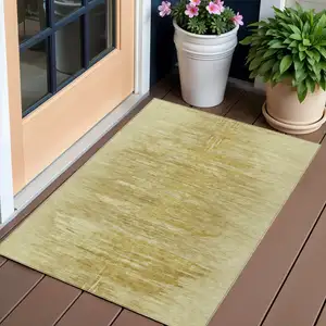 Photo of Gold And Wheat Abstract Washable Indoor Outdoor Area Rug