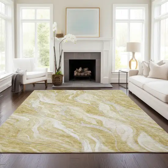 Gold Beige And Ivory Abstract Washable Indoor Outdoor Area Rug Photo 7