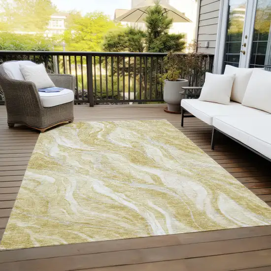 Gold Beige And Ivory Abstract Washable Indoor Outdoor Area Rug Photo 9