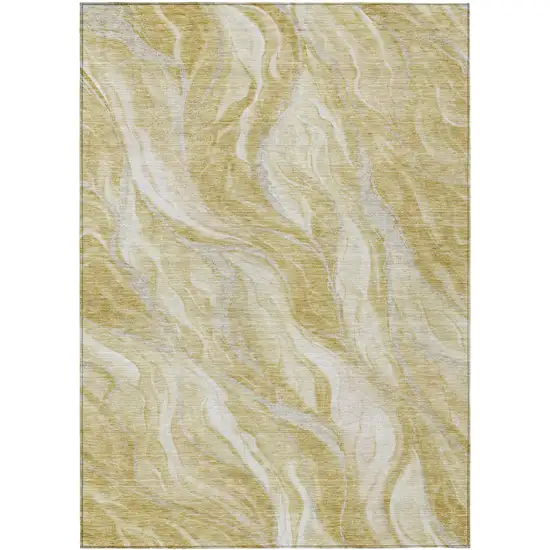 Gold Beige And Ivory Abstract Washable Indoor Outdoor Area Rug Photo 1