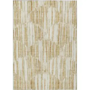 Photo of Gold Beige And Ivory Abstract Washable Indoor Outdoor Area Rug